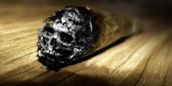Текст на пачках сигарет дополнят графикой